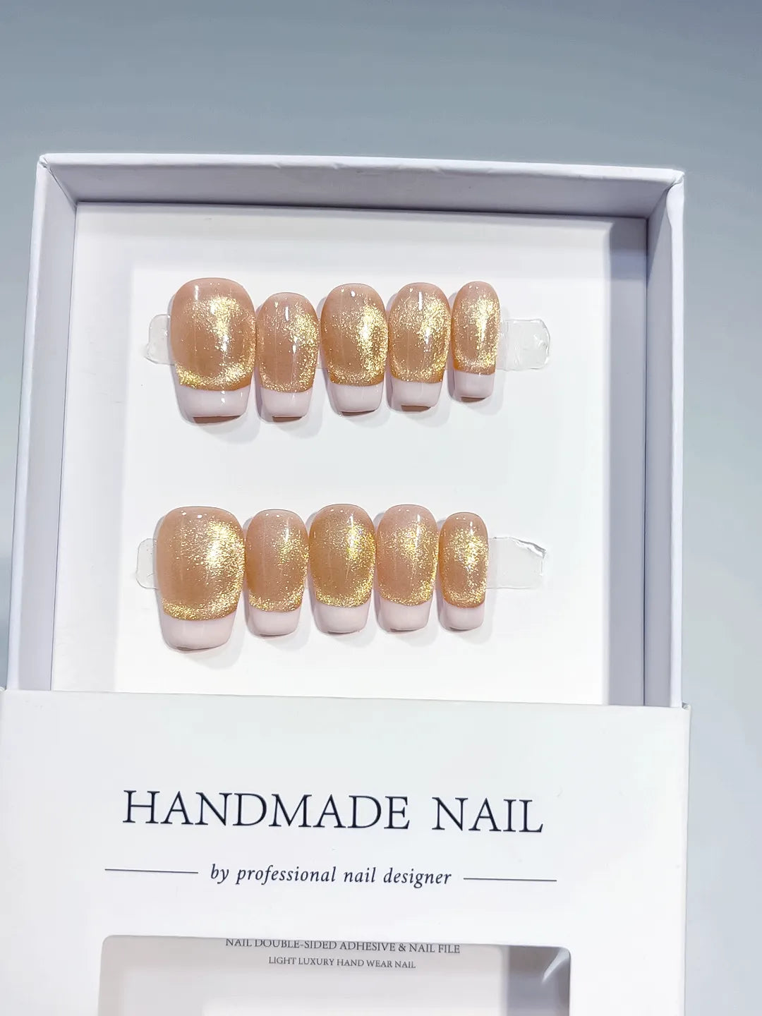 B143 - Short Nude Gold Coffin French tip