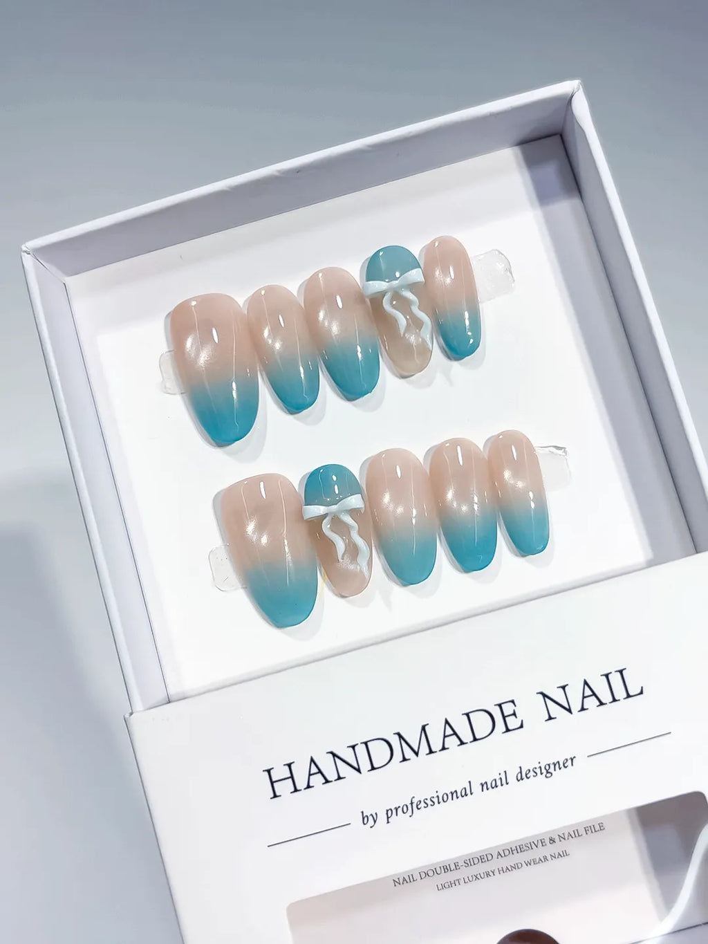 B140 - Medium Nude Blue Oval Ombre Bow
