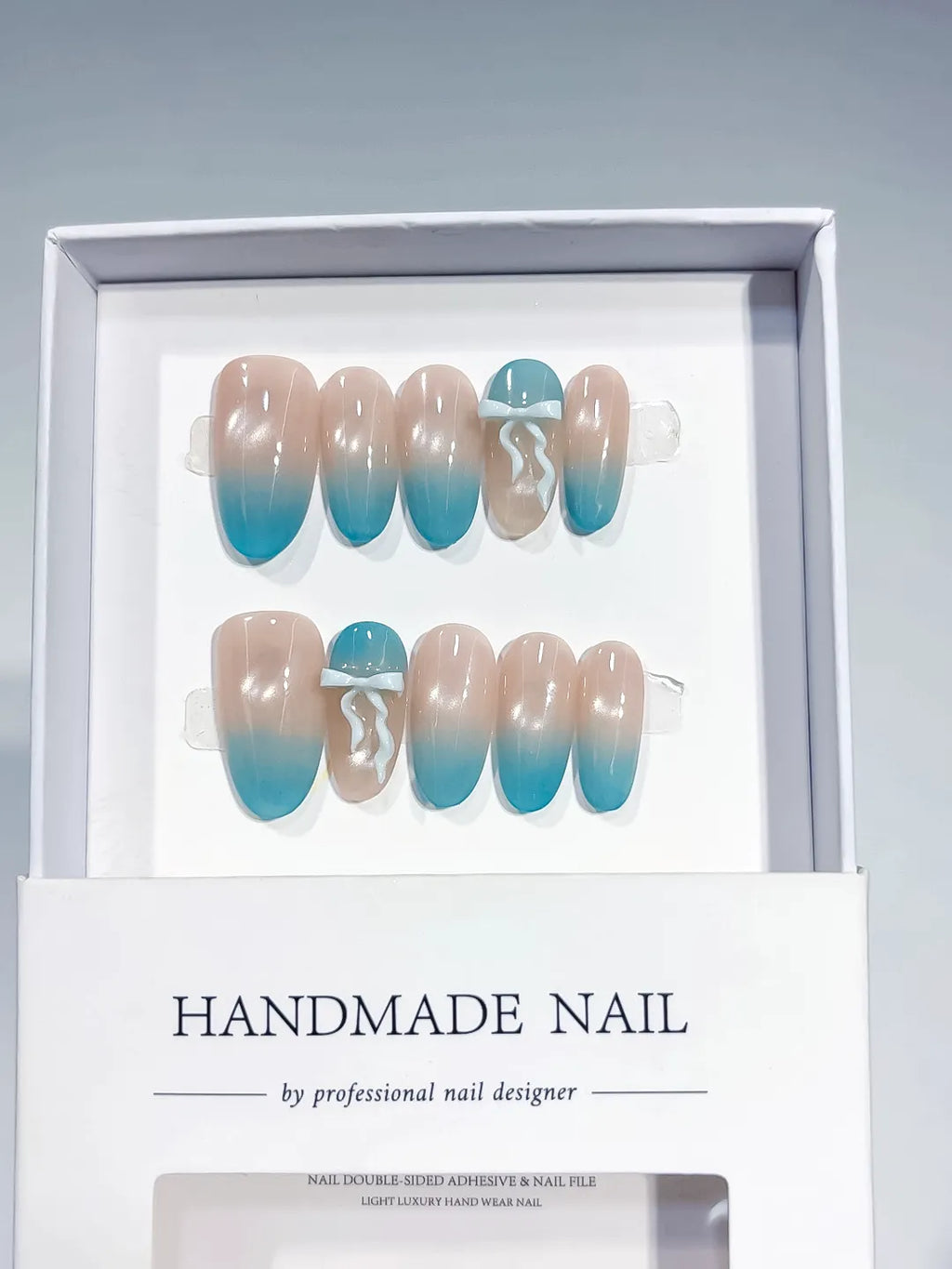 B140 - Medium Nude Blue Oval Ombre Bow