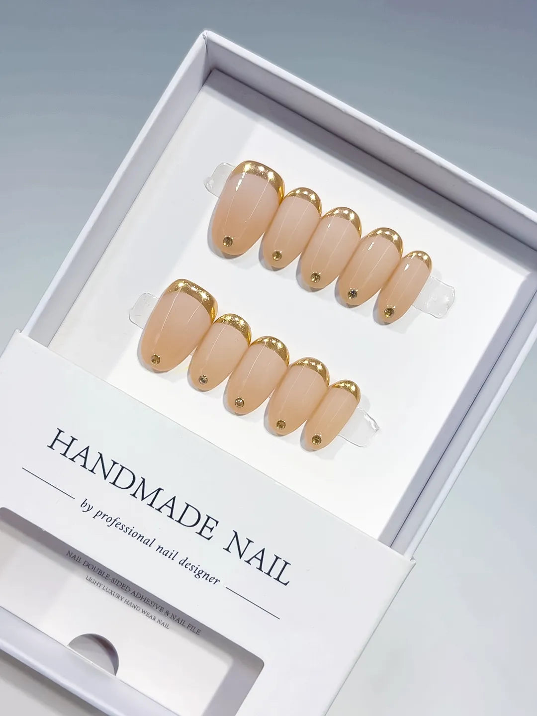 B145 - Short Nude Gold Oval French tip Rhinestone