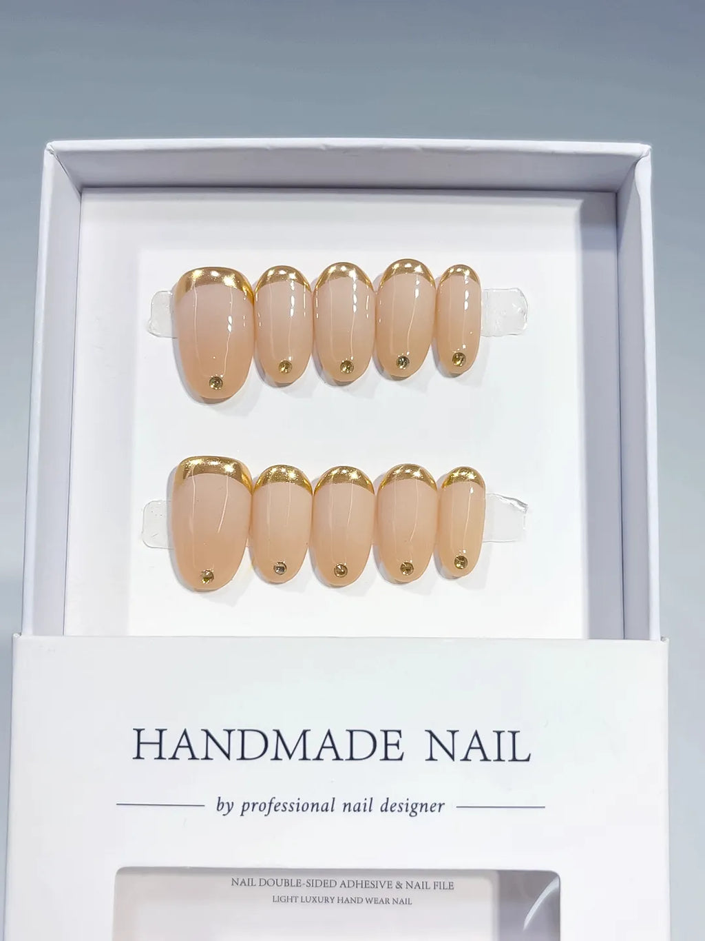 B145 - Short Nude Gold Oval French tip Rhinestone
