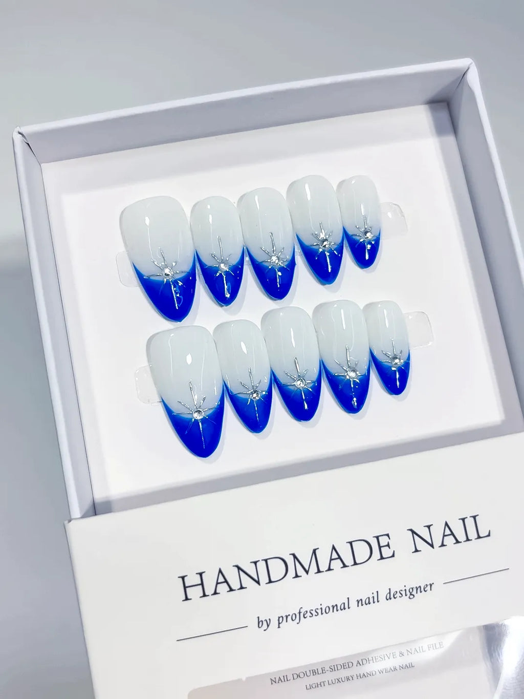 C368 - Medium Blue Almond French tip Rhinestone