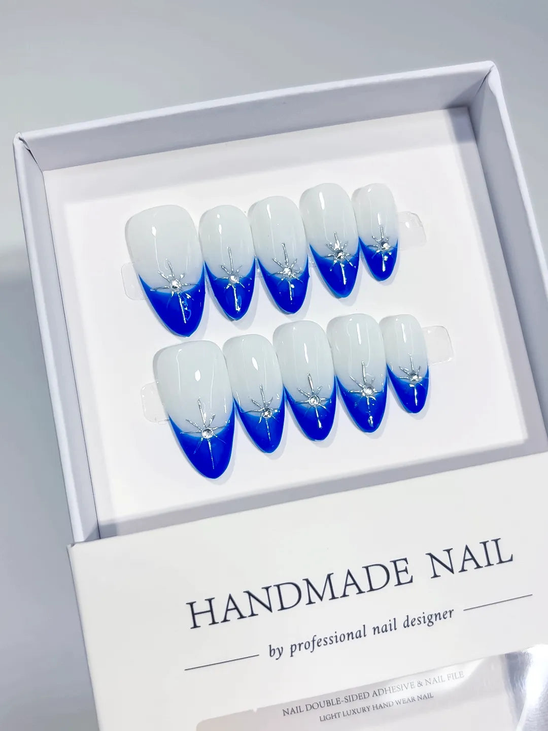 C368 - Medium Blue Almond French tip Rhinestone