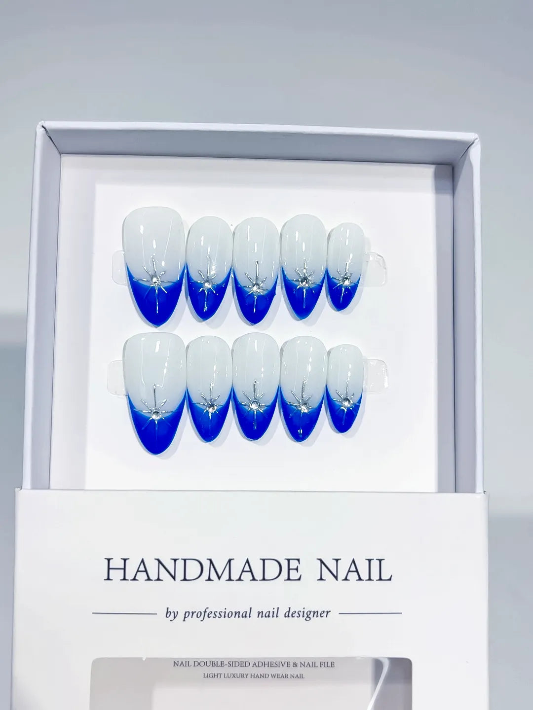 C368 - Medium Blue Almond French tip Rhinestone