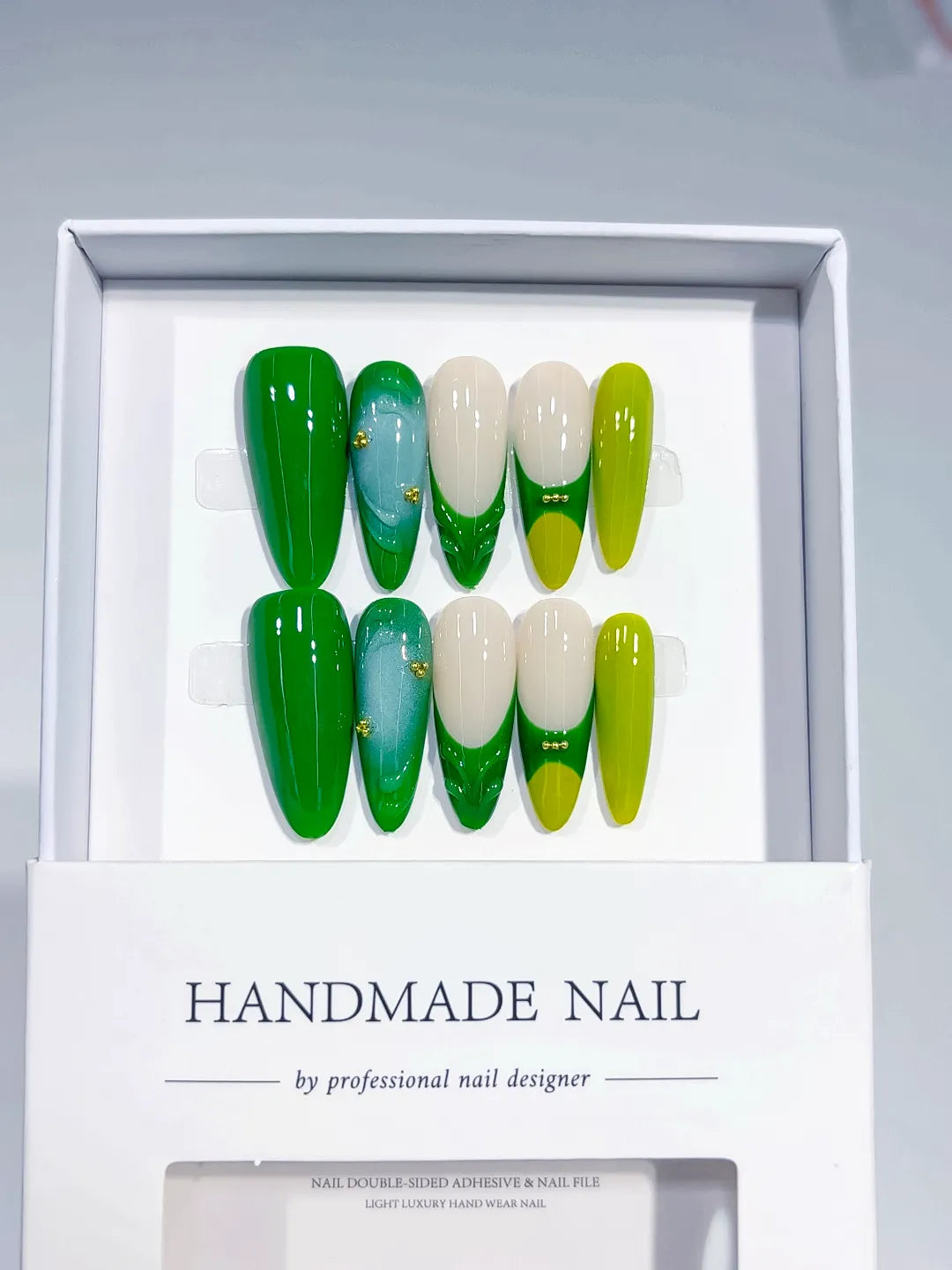 C375 - Long Green Almond Abstract Swirl Bead