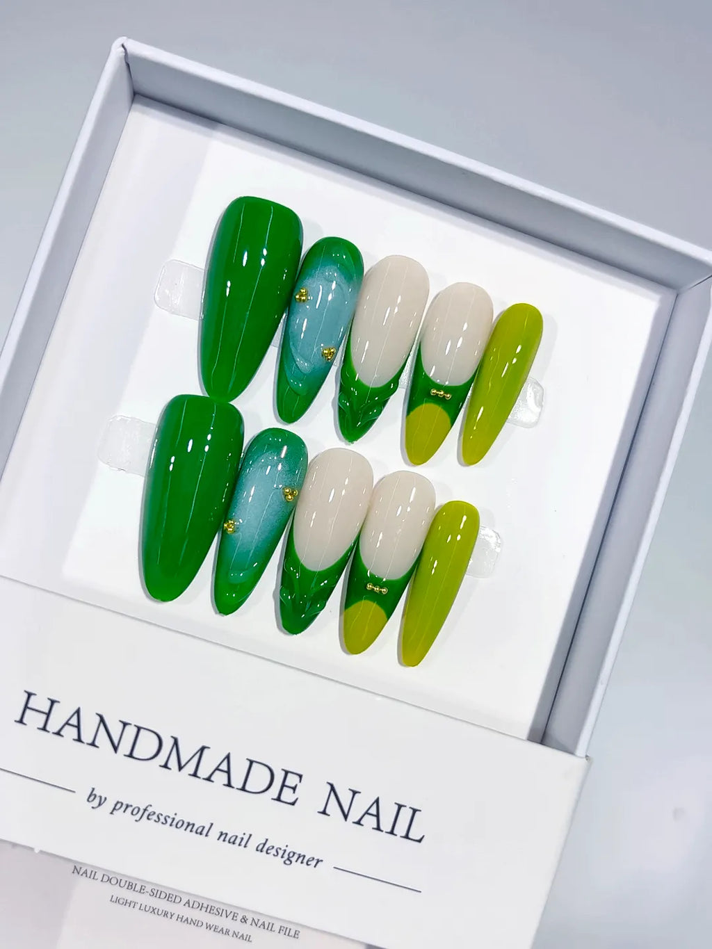 C375 - Long Green Almond Abstract Swirl Bead