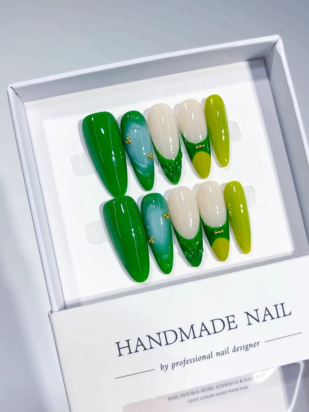C375 - Long Green Almond Abstract Swirl Bead