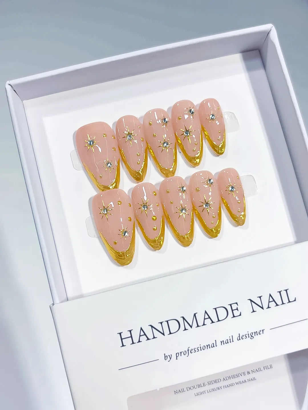 C378 - Medium Nude Gold Almond French tip Rhinestone