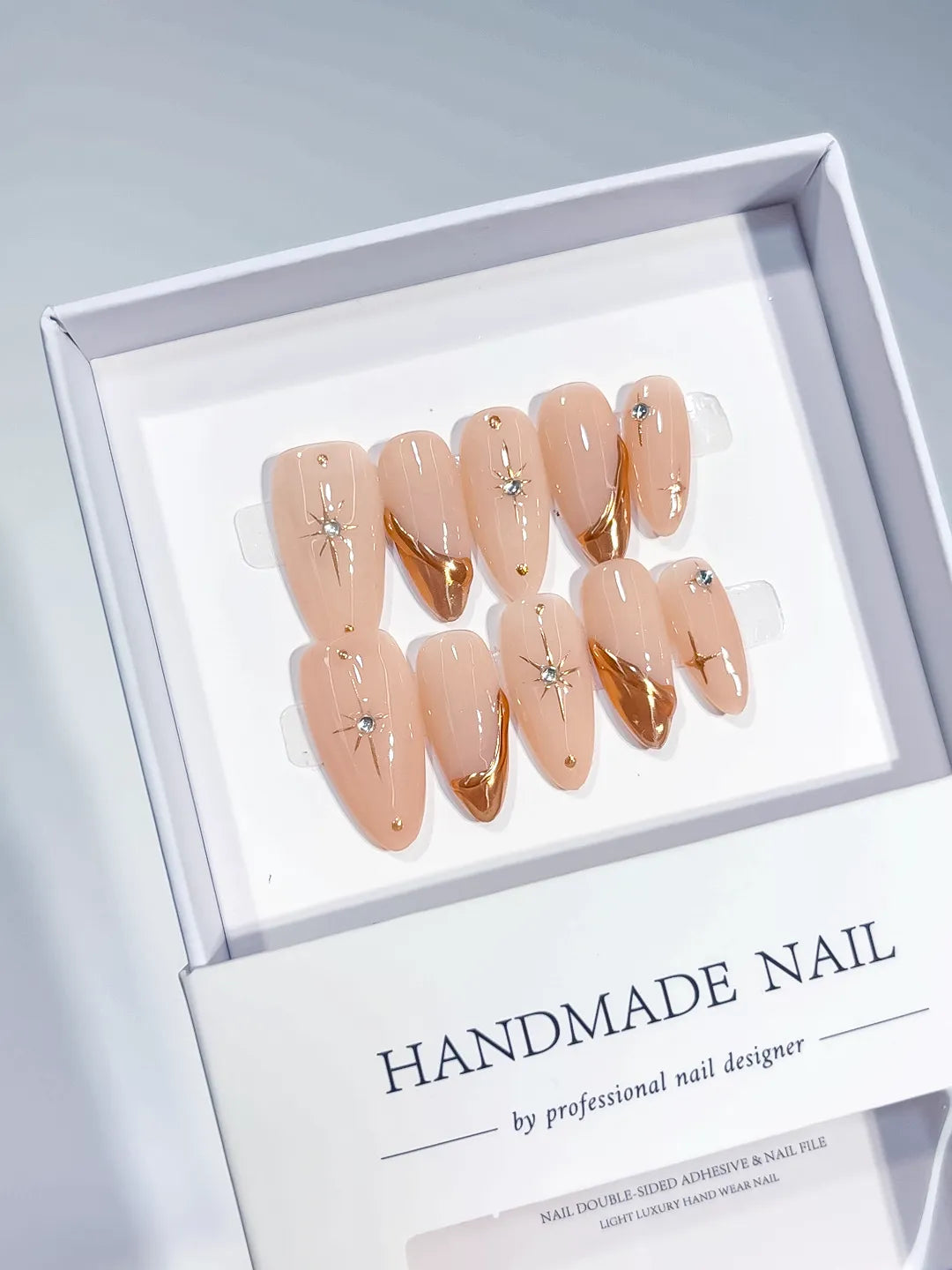 C384 - Medium Nude Gold Almond Metallic Star Rhinestone VibeNailsLab