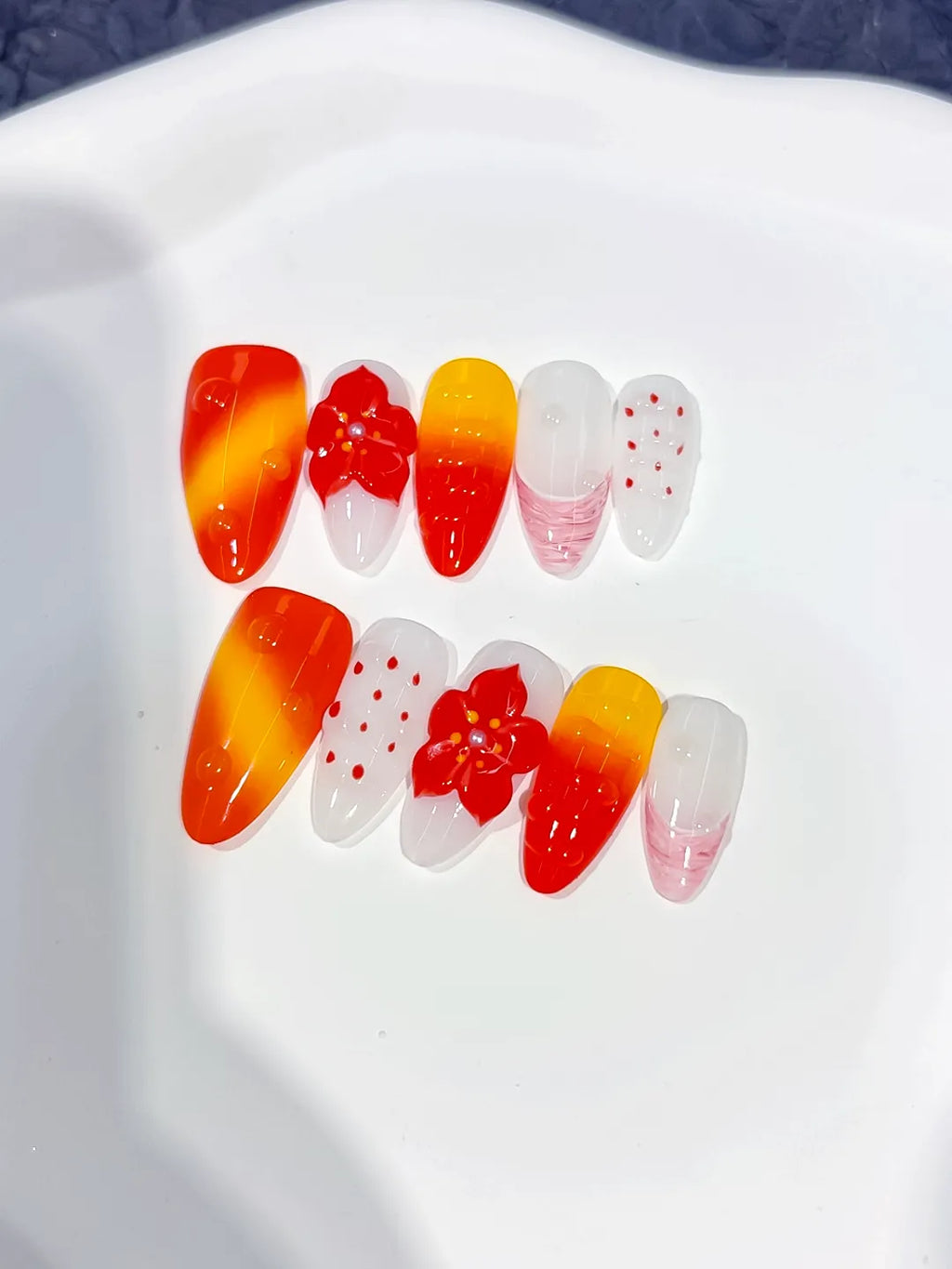 D546 - Medium Red Orange Almond Ombre Flower Dot Pattern