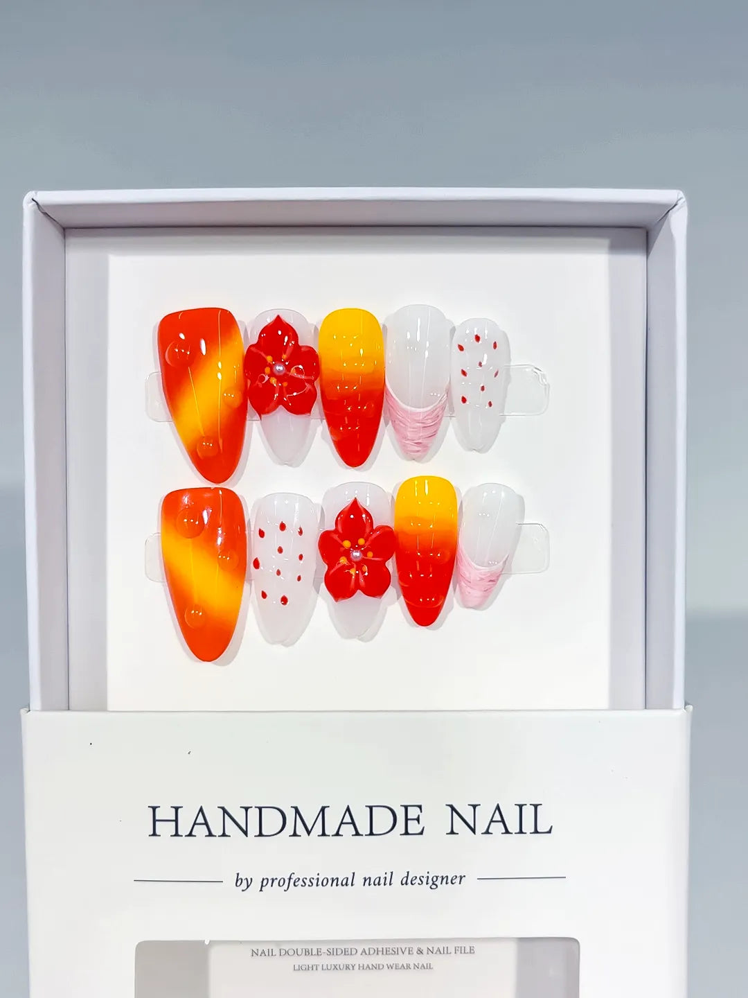 D546 - Medium Red Orange Almond Ombre Flower Dot Pattern