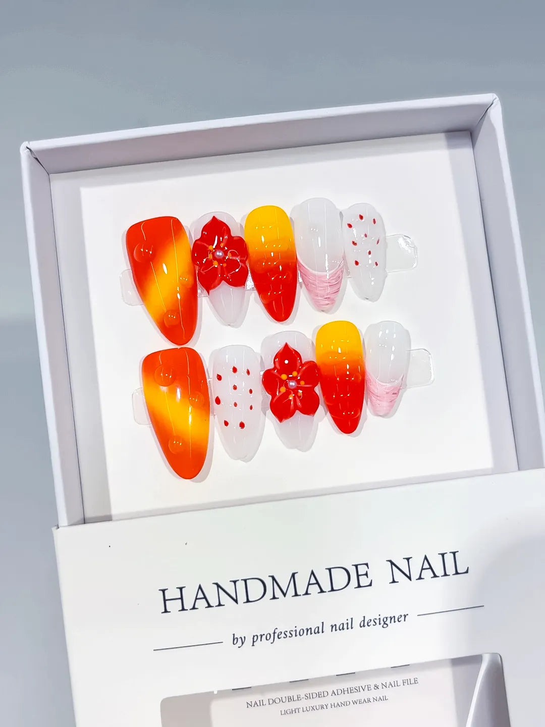 D546 - Medium Red Orange Almond Ombre Flower Dot Pattern