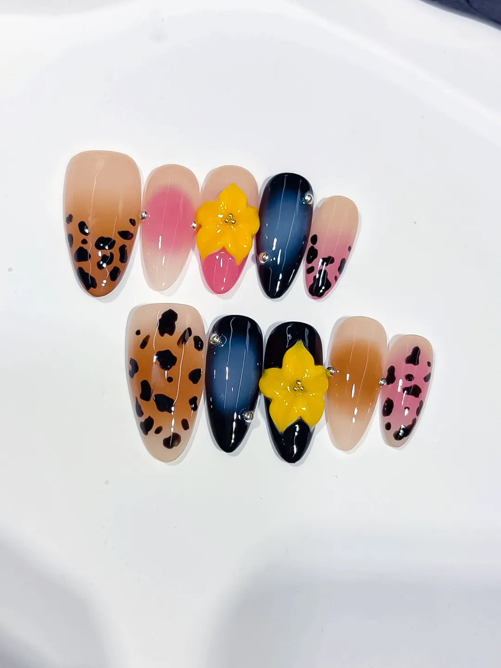 D552 - Medium Nude Brown Almond Abstract Flower Animal Print