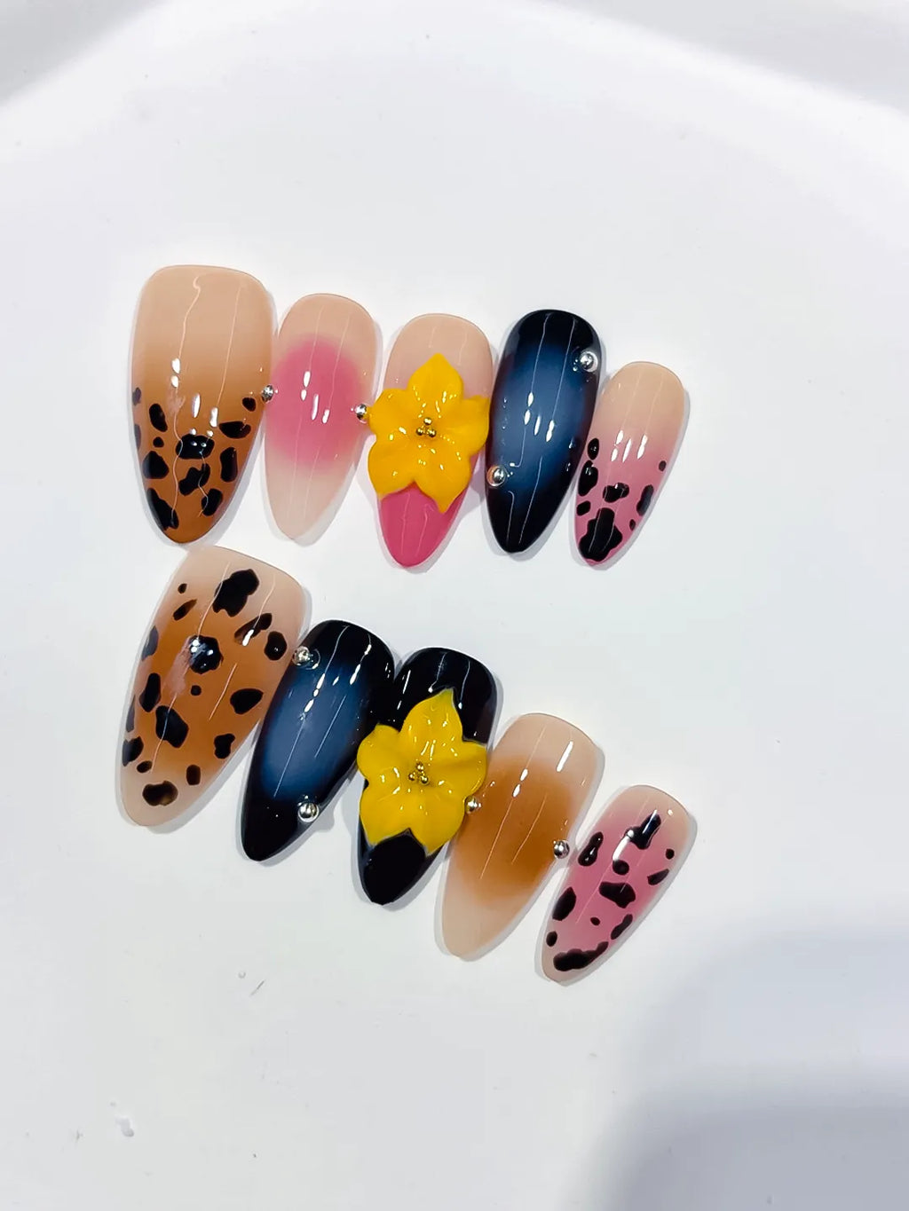 D552 - Medium Nude Brown Almond Abstract Flower Animal Print