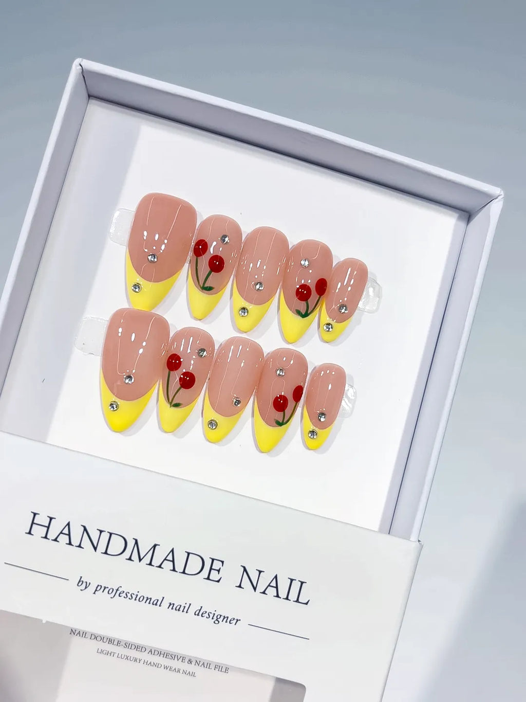 C393 - Medium Nude Yellow Almond French tip Cherry Rhinestone