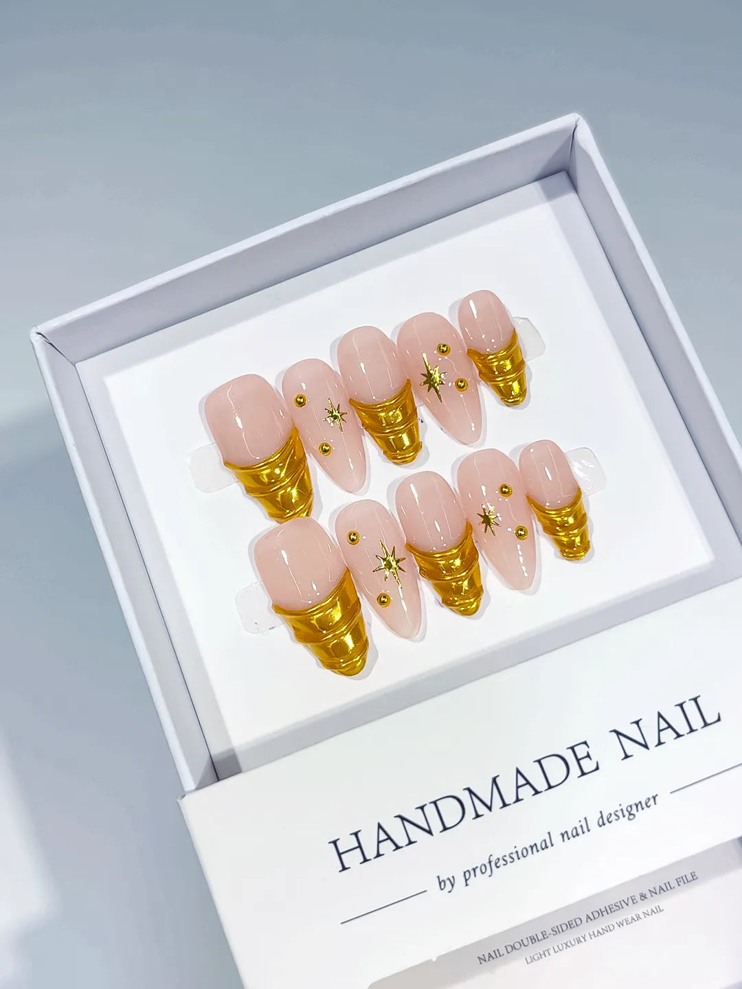 C398 - Medium Nude Gold Almond Metallic Star Gold Stud