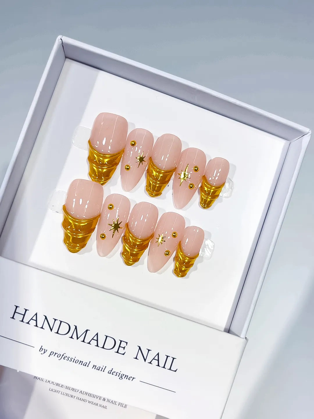 C398 - Medium Nude Gold Almond Metallic Star Gold Stud