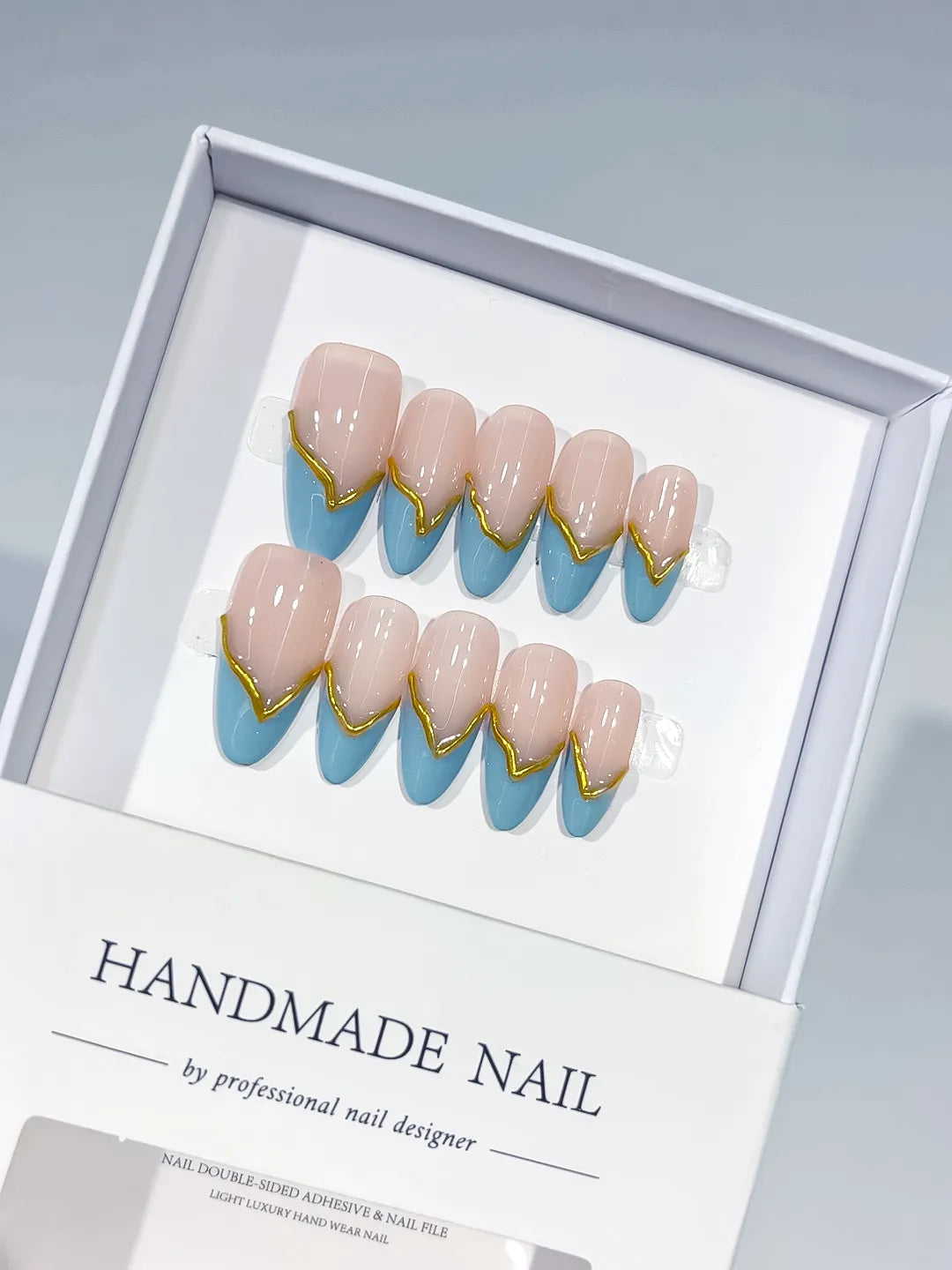 C406 - Medium Nude Blue Almond French tip Gold Outline VibeNailsLab