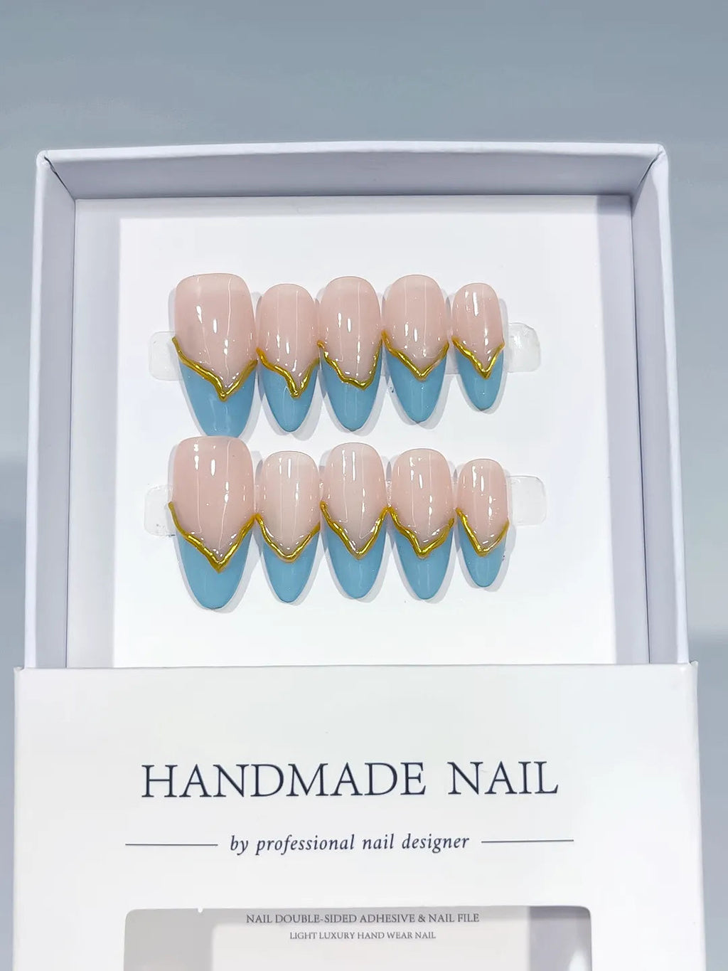 C406 - Medium Nude Blue Almond French tip Gold Outline VibeNailsLab