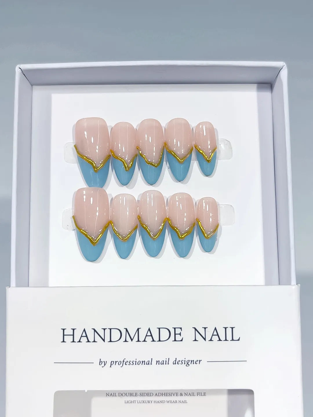 C406 - Medium Nude Blue Almond French tip Gold Outline VibeNailsLab