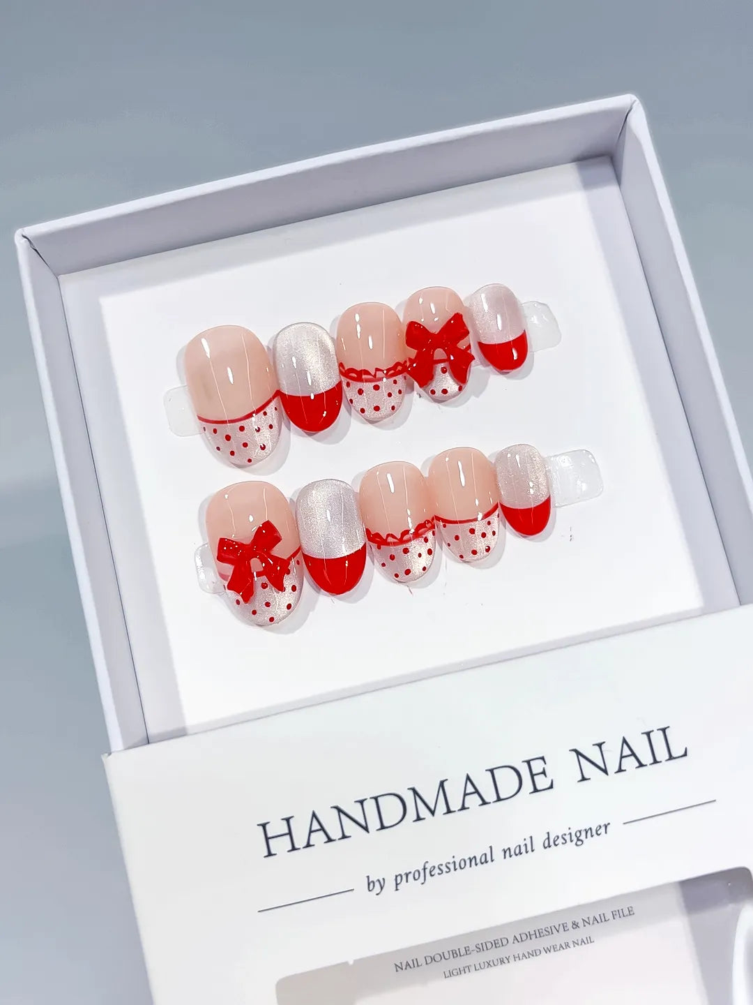 C411 - Medium White Red Oval French tip Bow Polka Dot