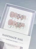 C414 - Medium Nude White Almond French tip Petal Rhinestone VibeNailsLab