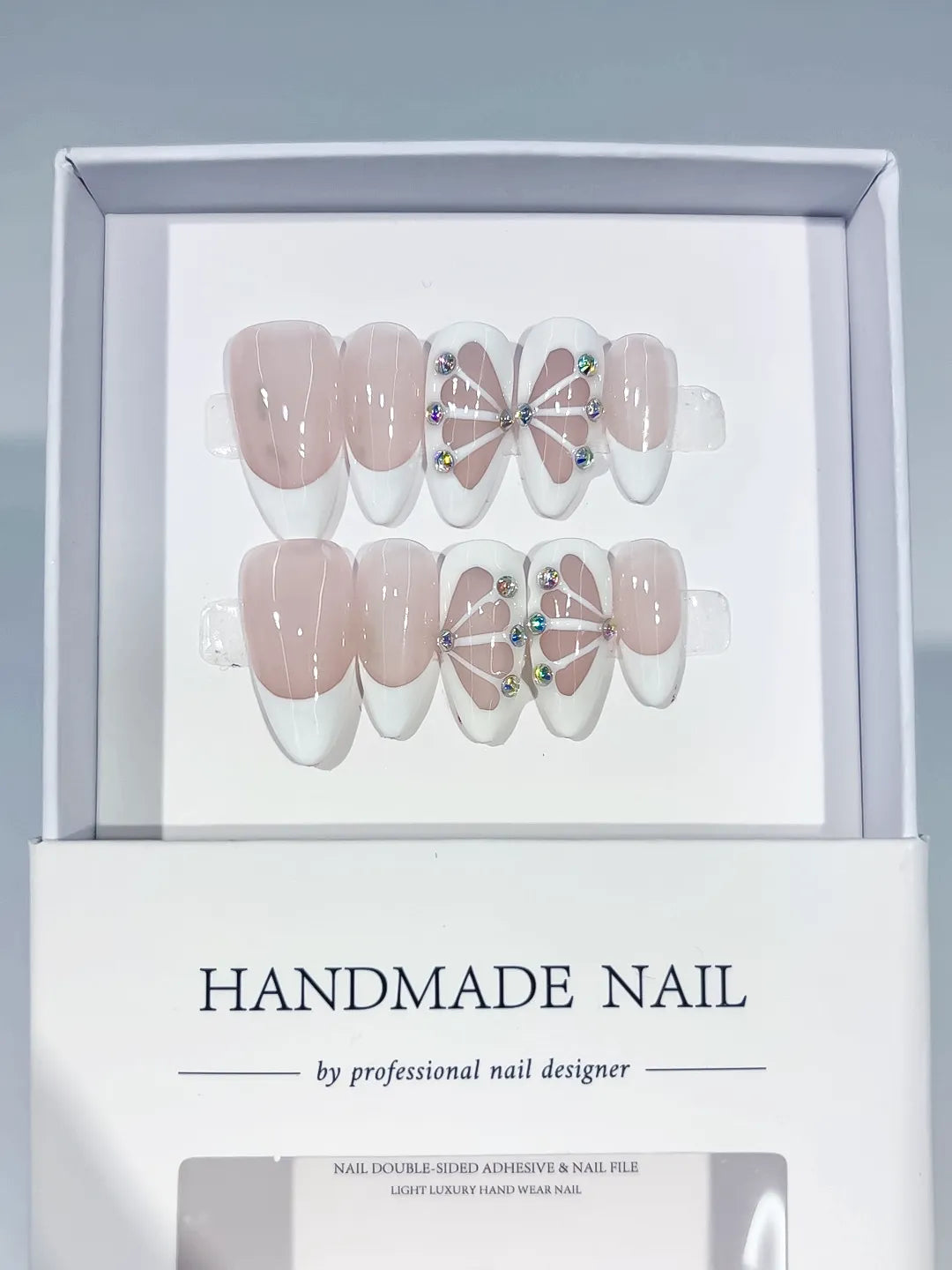 C414 - Medium Nude White Almond French tip Petal Rhinestone VibeNailsLab