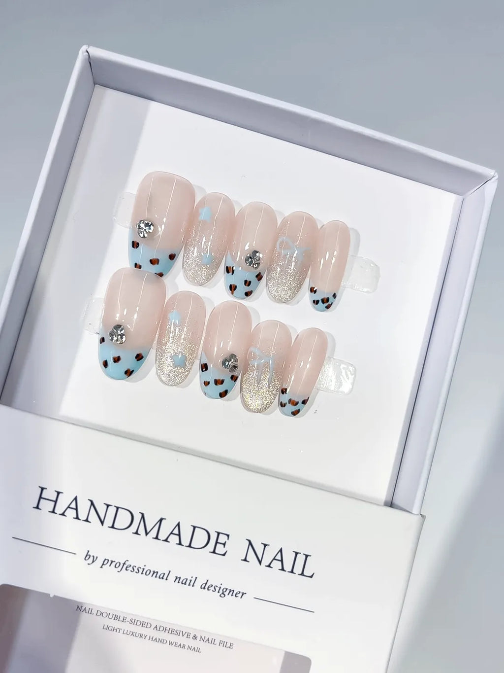 C416 - Medium Nude Blue Oval French tip Animal Print Glitter