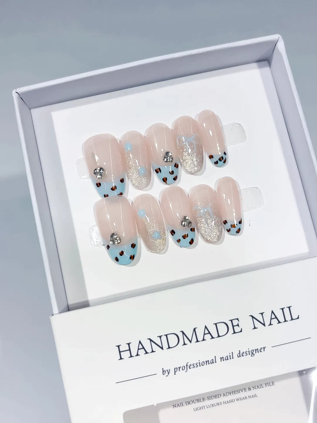 C416 - Medium Nude Blue Oval French tip Animal Print Glitter