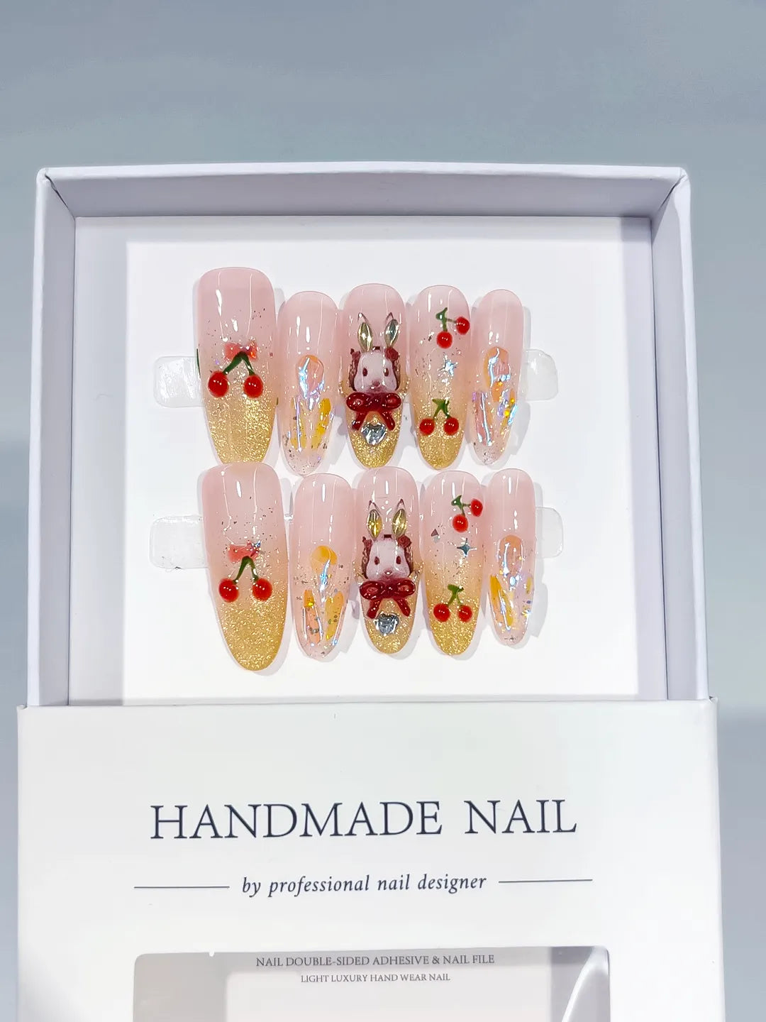 C422 - Long Nude Gold Oval Glitter Cherry Bunny