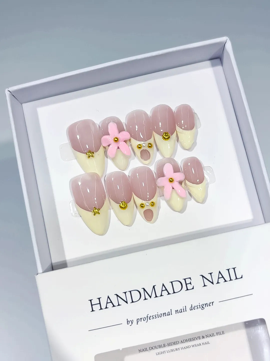 C426 - Medium Nude Pink Almond French tip Flower Gold Stud VibeNailsLab