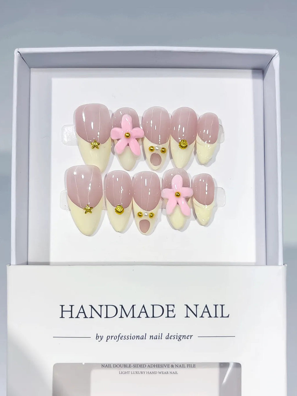 C426 - Medium Nude Pink Almond French tip Flower Gold Stud VibeNailsLab
