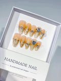 C431 - Medium Orange Gold Almond Glitter Rhinestone Pearl VibeNailsLab