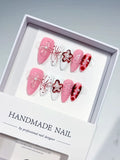 D247 - Medium Pink White Almond Abstract Bow Flower