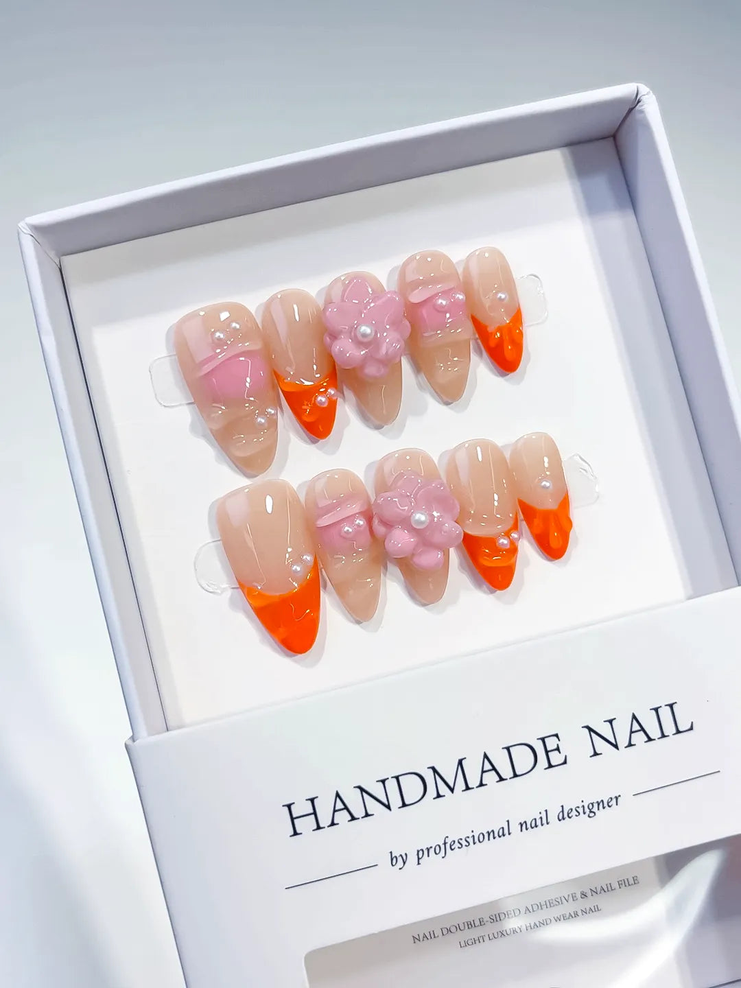 D261 - Medium Nude Orange Almond French tip Flower Pearl