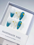 D275 - Medium Blue White Almond Glitter Starfish Shell