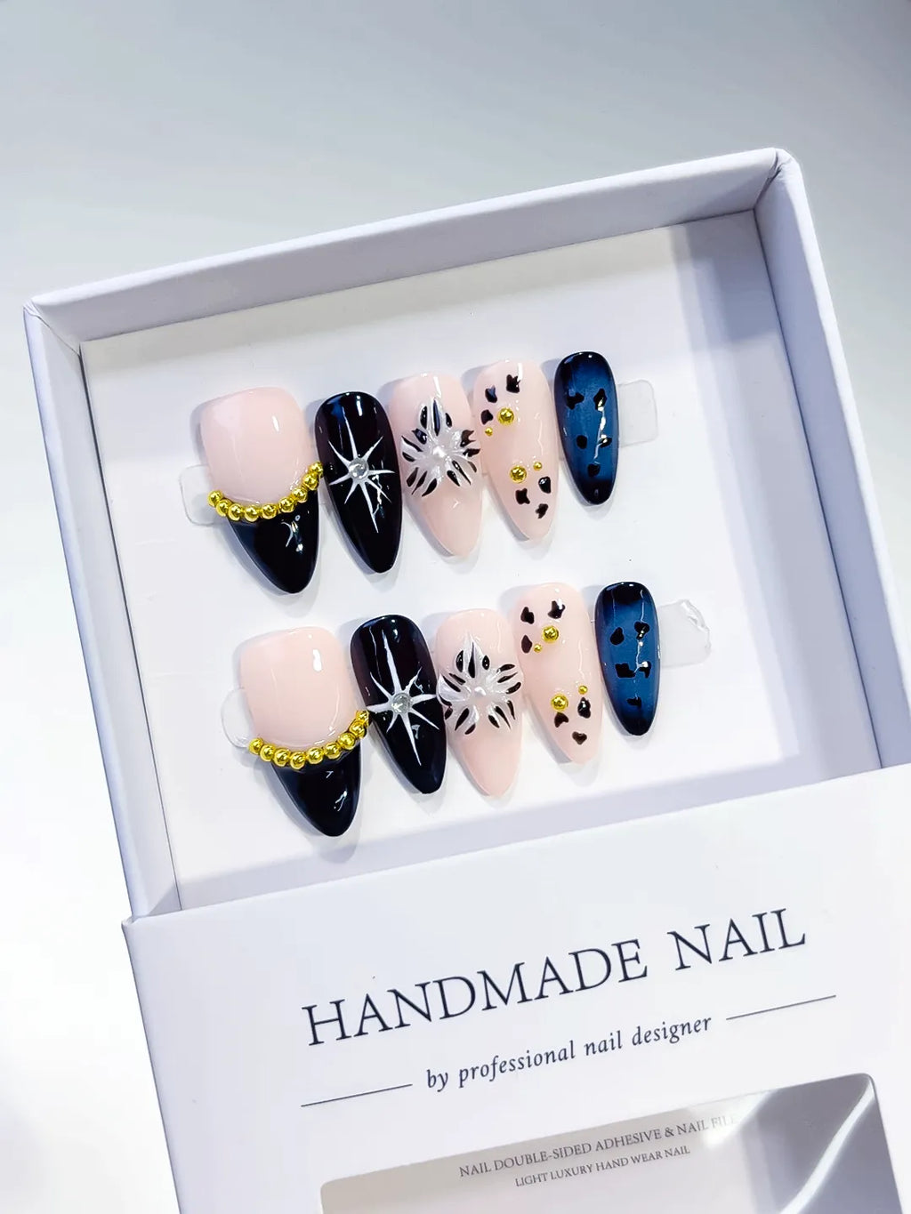 D291 - Medium Nude Black Almond French tip Star Animal Print