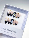 D319 - Medium Nude Black Almond French tip Flower Rhinestone VibeNailsLab