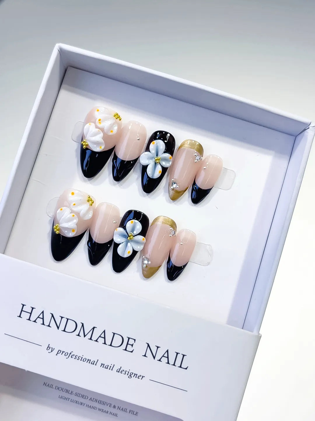 D319 - Medium Nude Black Almond French tip Flower Rhinestone VibeNailsLab