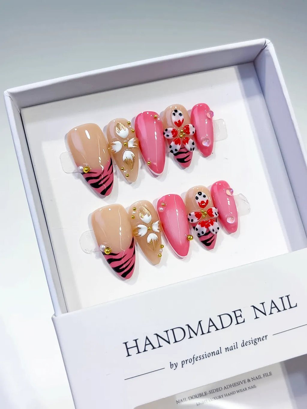 D330 - Medium Pink Gold Almond Abstract Heart Animal Print VibeNailsLab