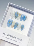 D357 - Medium Blue White Almond Holographic Shell Bow