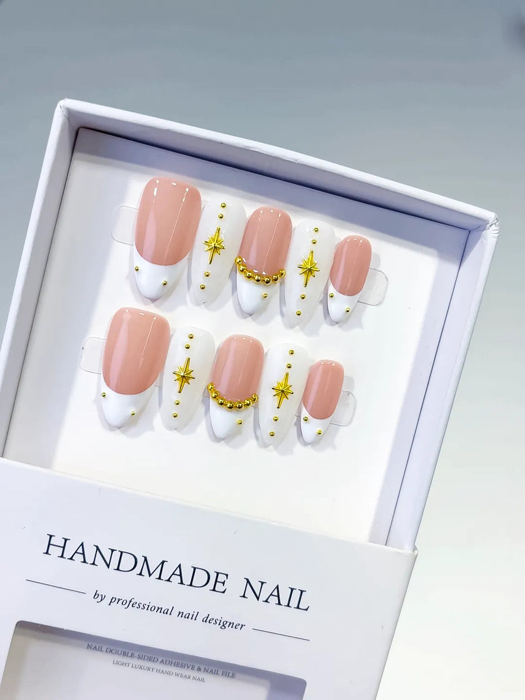 C440 - Medium Nude White Almond French tip Star Gold Bead VibeNailsLab