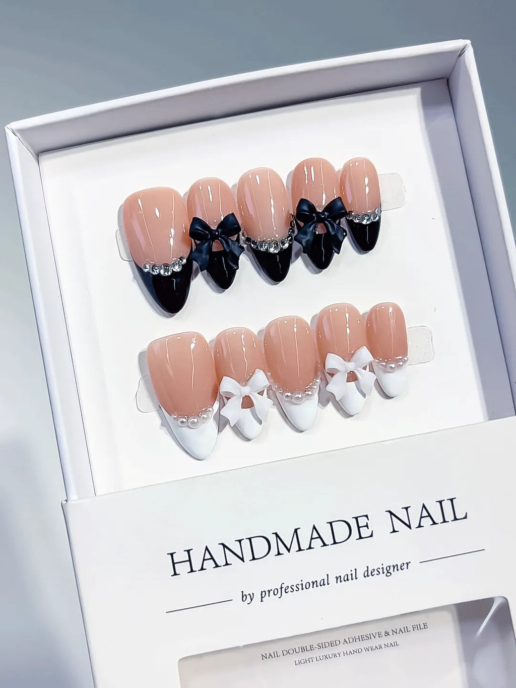 C451 - Medium Nude Black Almond French tip Bow Pearl VibeNailsLab