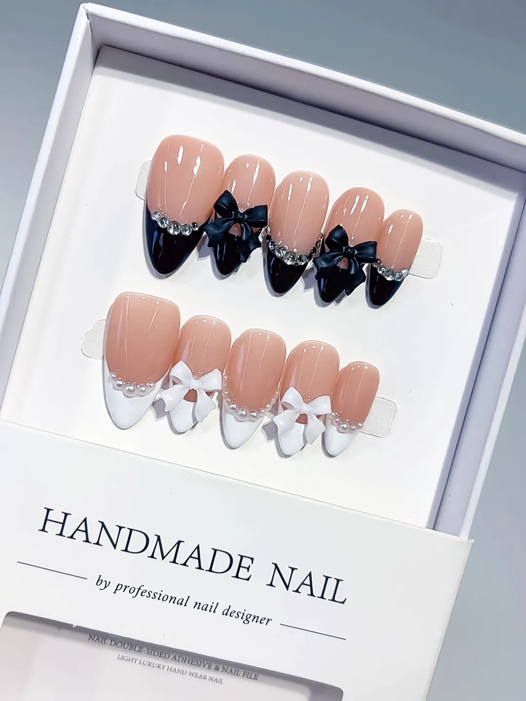 C451 - Medium Nude Black Almond French tip Bow Pearl VibeNailsLab