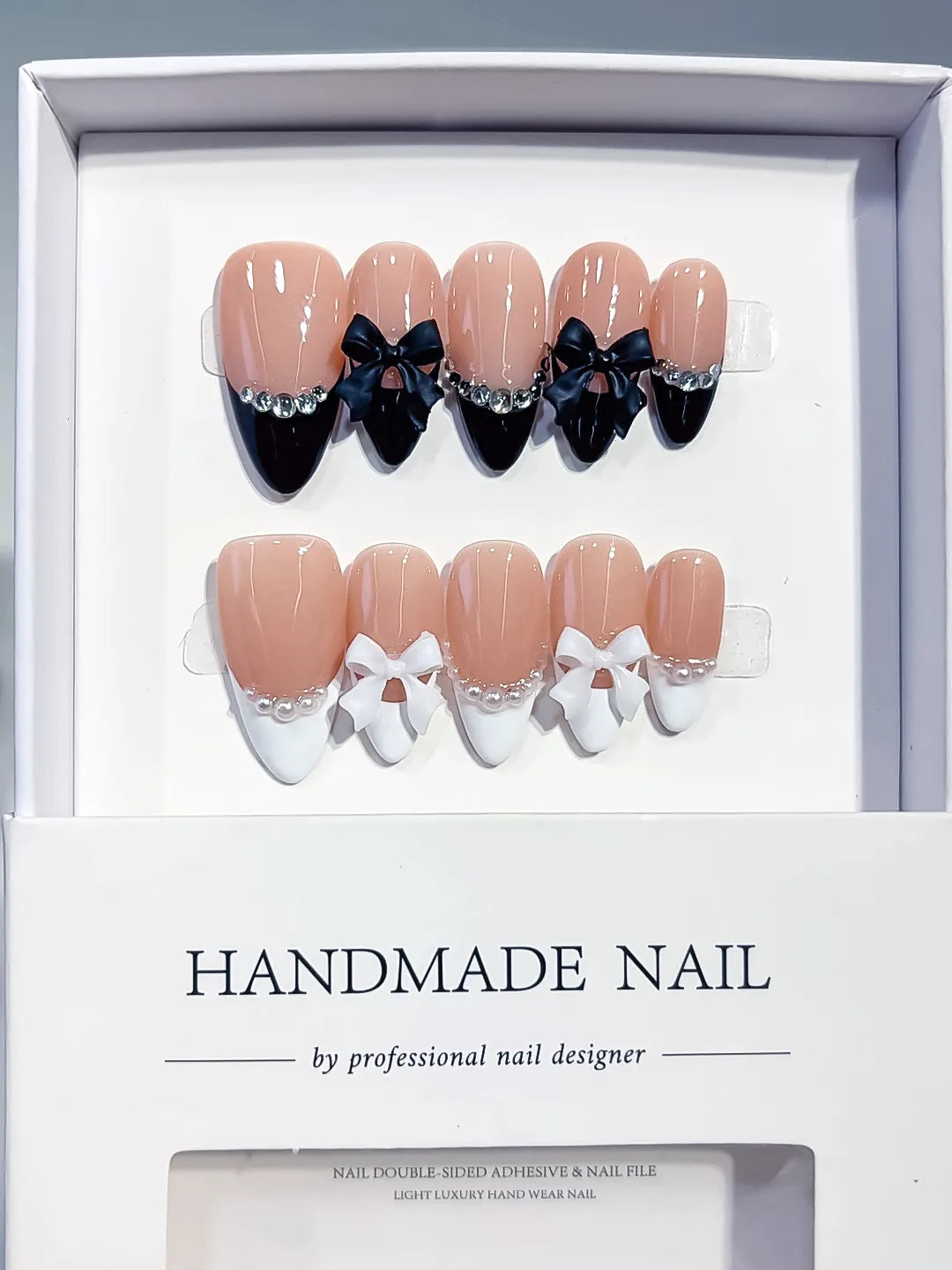 C451 - Medium Nude Black Almond French tip Bow Pearl VibeNailsLab